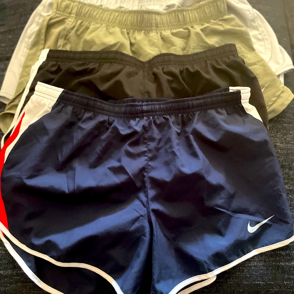 Nike women athletic shorts 4 pairs selling as an set size women’s large.